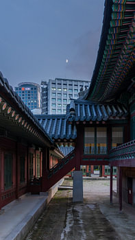 Deoksugung Palace  surrounded by modern buildings
