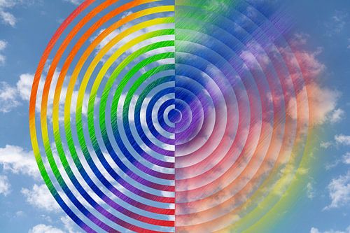 Circle pattern in the clouds with rainbow colours