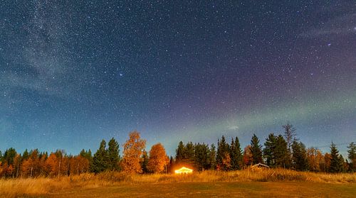 Magical aurora borealis over Myrkulla Lodge in Lapland