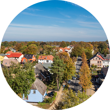 Buildings with blue sky in Wustrow, Germany van Rico Ködder