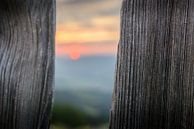 Zonsondergang achter een hek van Philippos Kloukas thumbnail