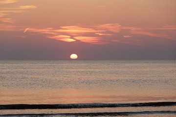 Zonsondergang in paars en oranje