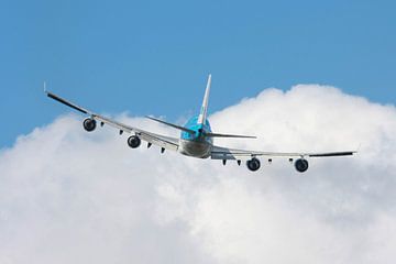 Departing Boeing 747 heading into the clouds by Roque Klop