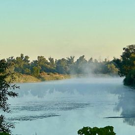 A mist-shrouded river in the morning light by Krümel_Visions