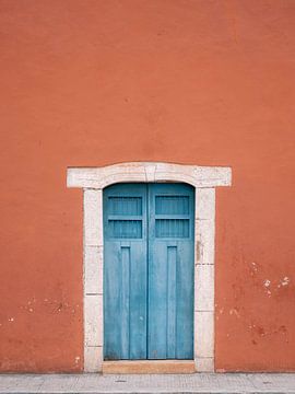 The blue door in Calzada de los Frailes, Valladolid Mexico by Raisa Zwart