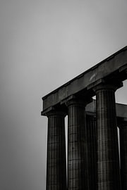 Black-and-white temple atop Calton Hill in Edinburgh, Scotland by Koen Lipman