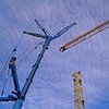 Mobile crane during the assembly of a tower crane by Babetts Bildergalerie