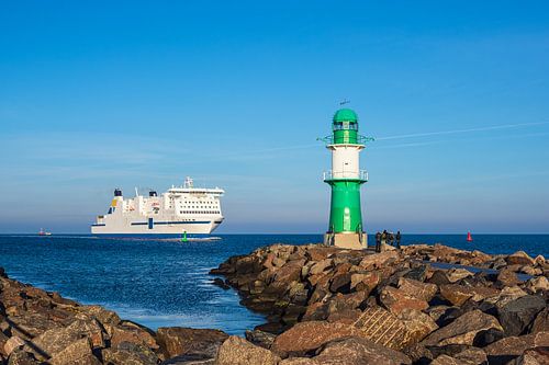 Pier on the coast of the Baltic Sea with ferry in Warnemünde