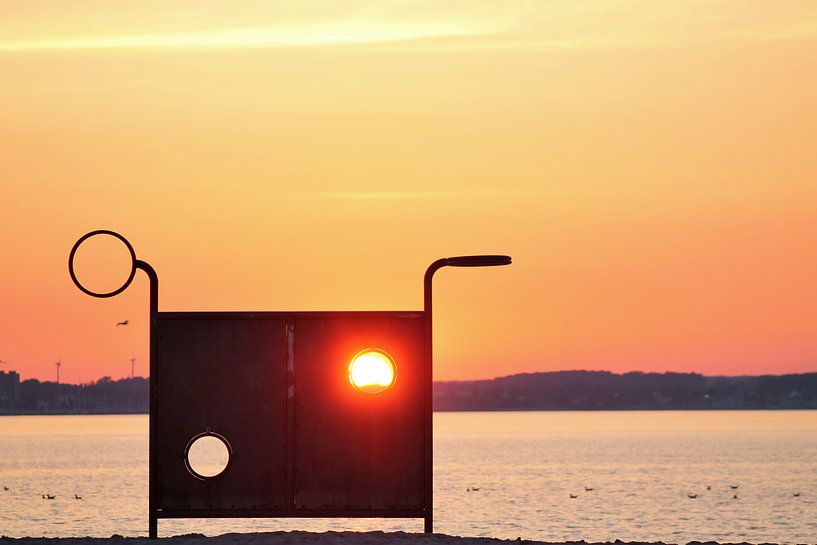 Beautiful orange sunset at the baltic sea shining through a goal wall by MPfoto71