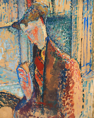 Zerbrochene sitzende Figur