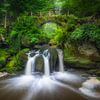 De Schiessentümpel waterval in het Müllerthal in Luxemburg van Bas Meelker