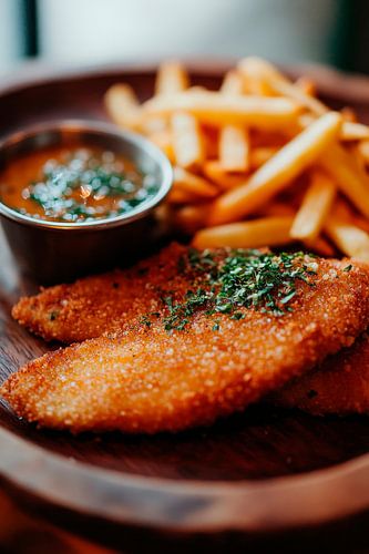 Delicious schnitzel with chips