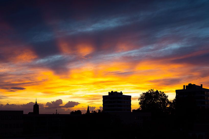 Skyline Enschede bij zonsondergang van Stef Kuipers