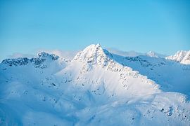 Winter Mountains near Tromso, Norway by Leo Schindzielorz