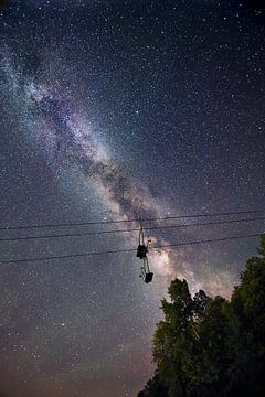 Galaxy behind cable car by Tim Emmerzaal