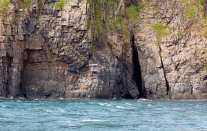 Fischerhütte an einer Klippe von Con Dao