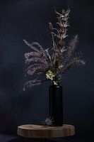 Still life (of dead flowers in a black vase)