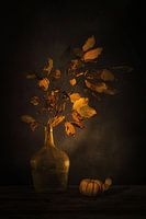 Ephemeral beauty. Still life with autumn branch and pumpkin .