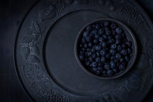 Blueberries in a dark atmosphere by Clazien Boot