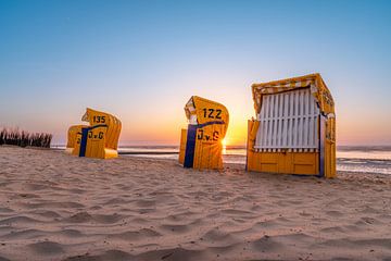 Beach chairs in the sunset light by cux-motive.de