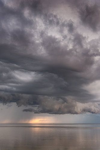 Cloudy sky in evening colour over the Wadden Sea