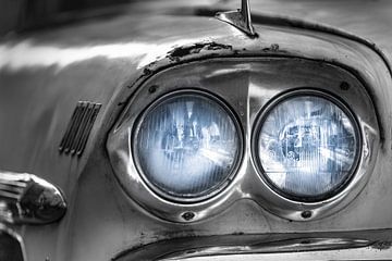 Classic white Chevrolet Bel Air with blue headlights close-up by Jan van Dasler