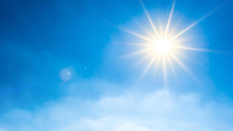Bright sun in the blue summer sky by Günter Albers