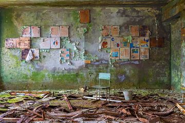 Teaching materials in an abandoned school classroom by Truus Nijland