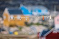 Clothesline with clothespins in Saqqaq, Greenland by Martijn Smeets thumbnail