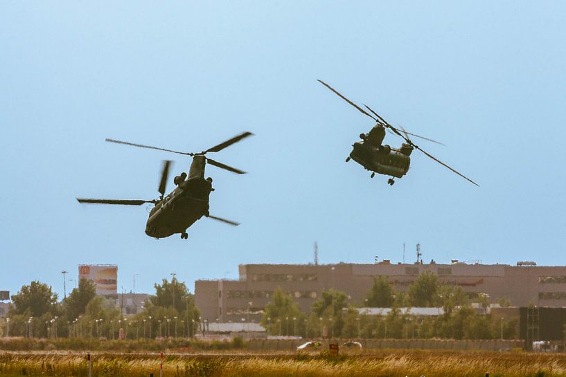 Two departing Chinooks by Roque Klop