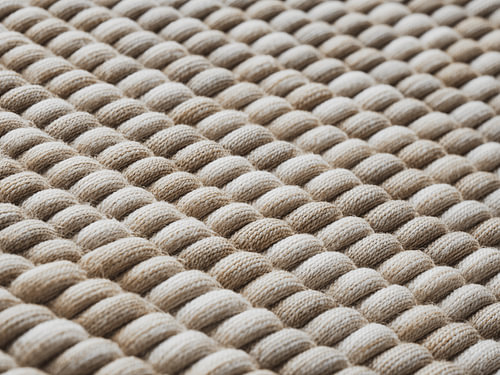 Close-up van de textuur van natuurlijk linnenweefsel