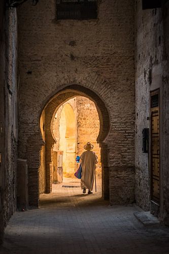 A characteristic man passing by in Fez, Morocco