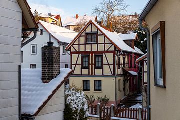 Herleshausen vakwerkhuizen in de winter van Roland Brack