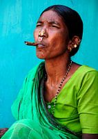 Cigar-smoking wife of one of India's adivasi.