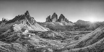 Dolomites with the Three Peaks in black and white .