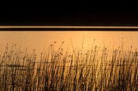 Zonsondergang boven het meer