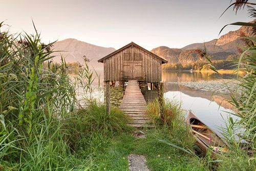 Boat hut at Kochelsee at sunrise, Bavaria, Germany