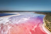 Aerial view of a brightly colored salt lake