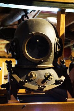 Old diving helmet, diver, diving suit by Maurits Bredius