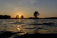 Sunset over a calm lake