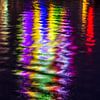 Lichtjes schitteren in het water van de Amstel von Wijbe Visser