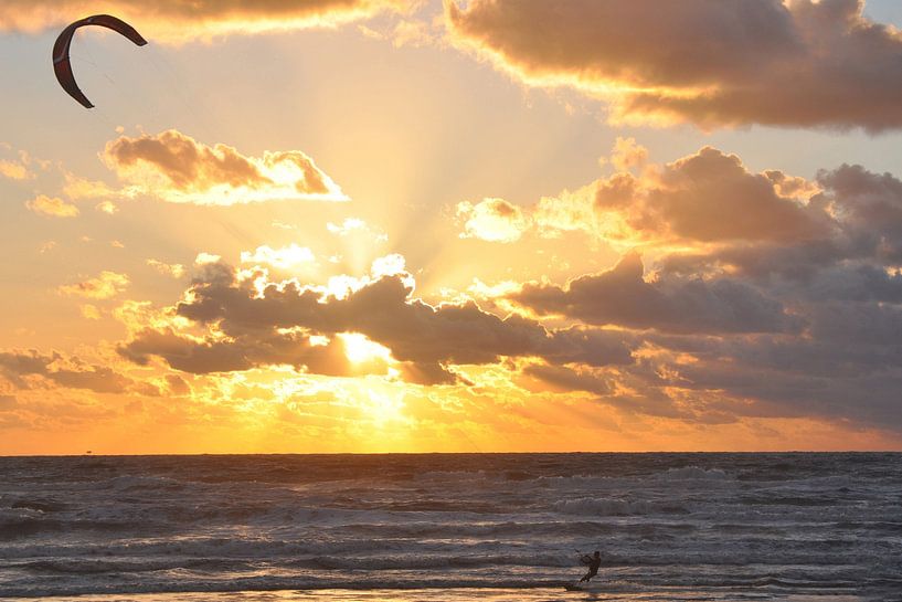 Kitesurfer during sunset by Ton Wever