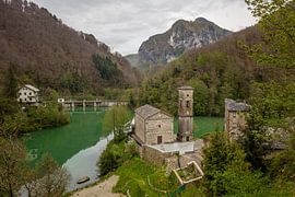 Small church at a pond between Toscany hills