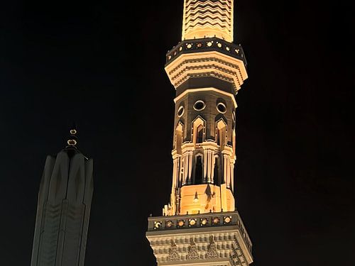 Illuminated Minaret at Night