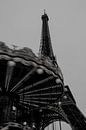 Eiffel Tower with moving carousel in black and white by Manon Visser thumbnail