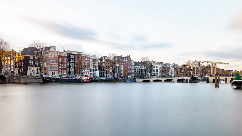 Amsterdam, le pont maigre et l'Amstel sur Arjan Almekinders