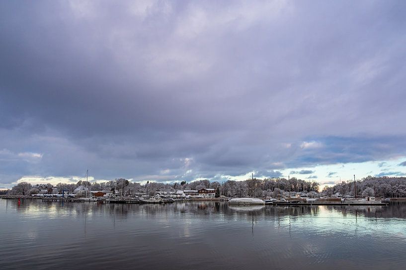 View over the Warnow to the Hanseatic city of Rostock in winter by Rico Ködder