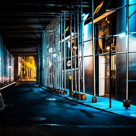 New York scaffolding in a dark alley by MICHEL WETTSTEIN