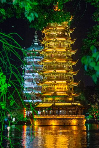The Sun and Moon Pagodas at Shan Lake in Guilin, China by Jan Fritz