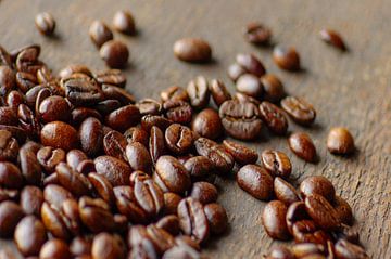 Rustic coffee beans picture on wood